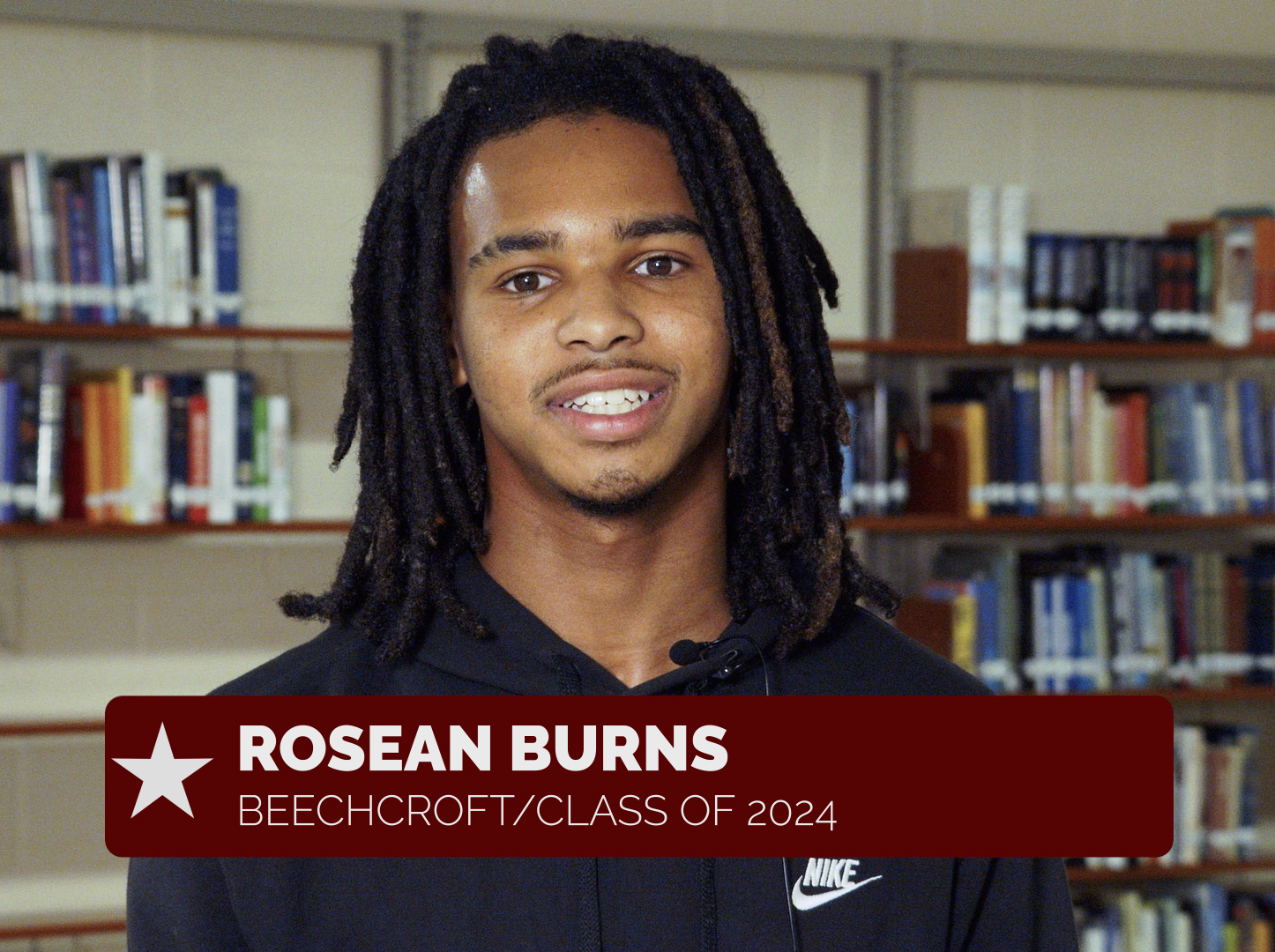 student smiling at camera named Rosean Burns